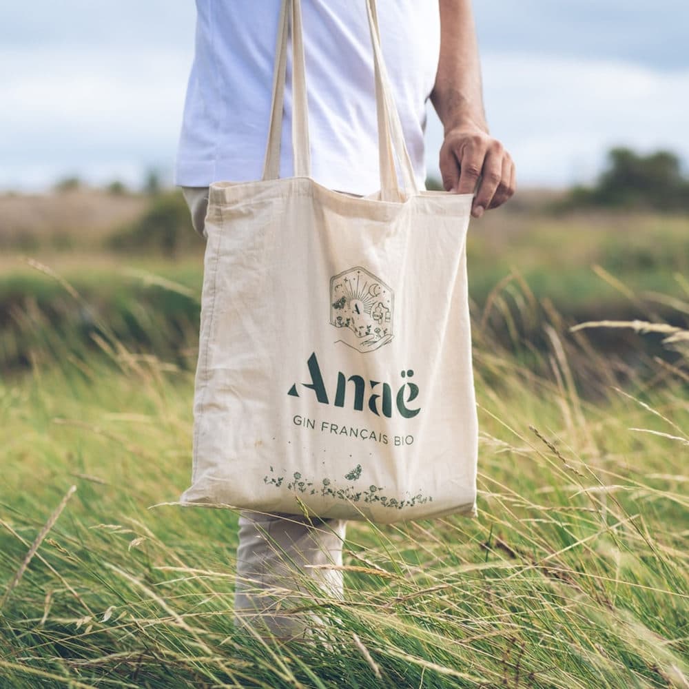 A branded tote carried outdoors