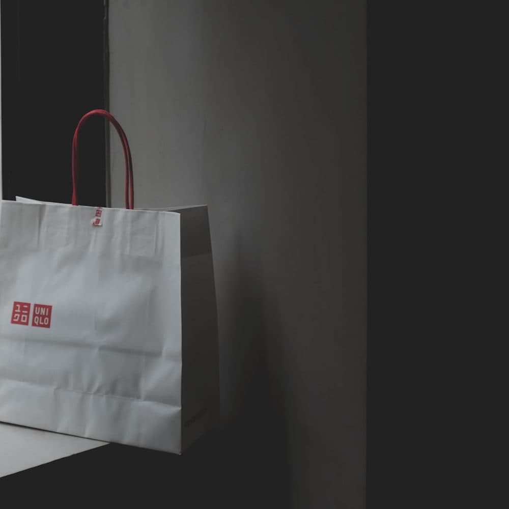 A paper carrier bag in raking light