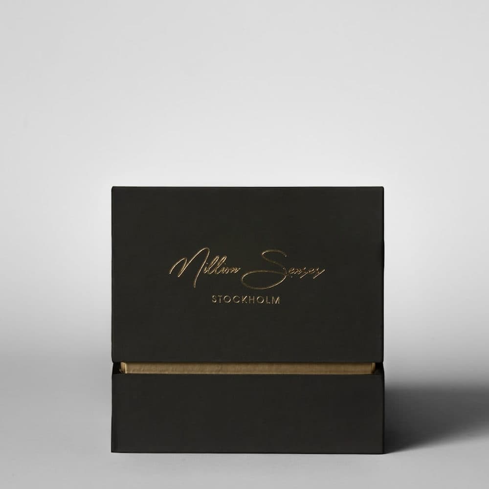 Black gift box with gold lettering