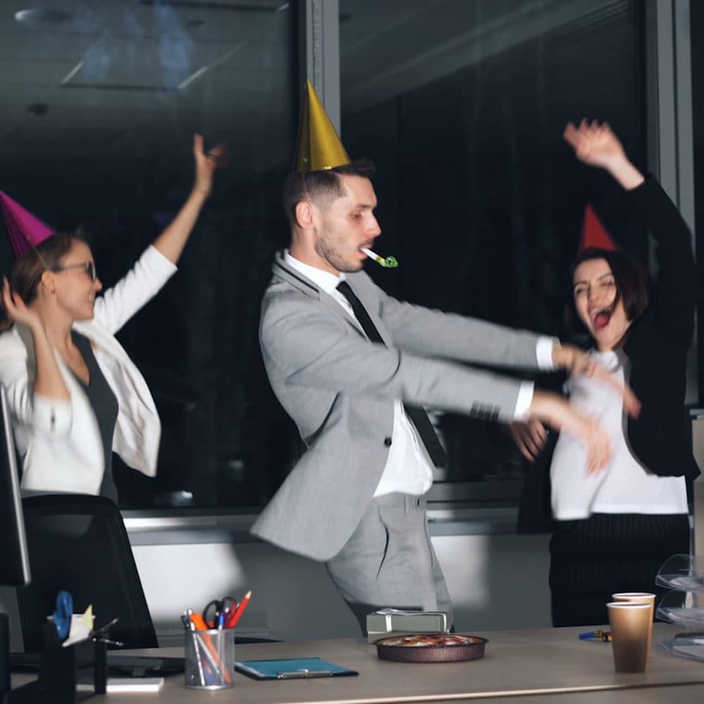 An office team celebrating