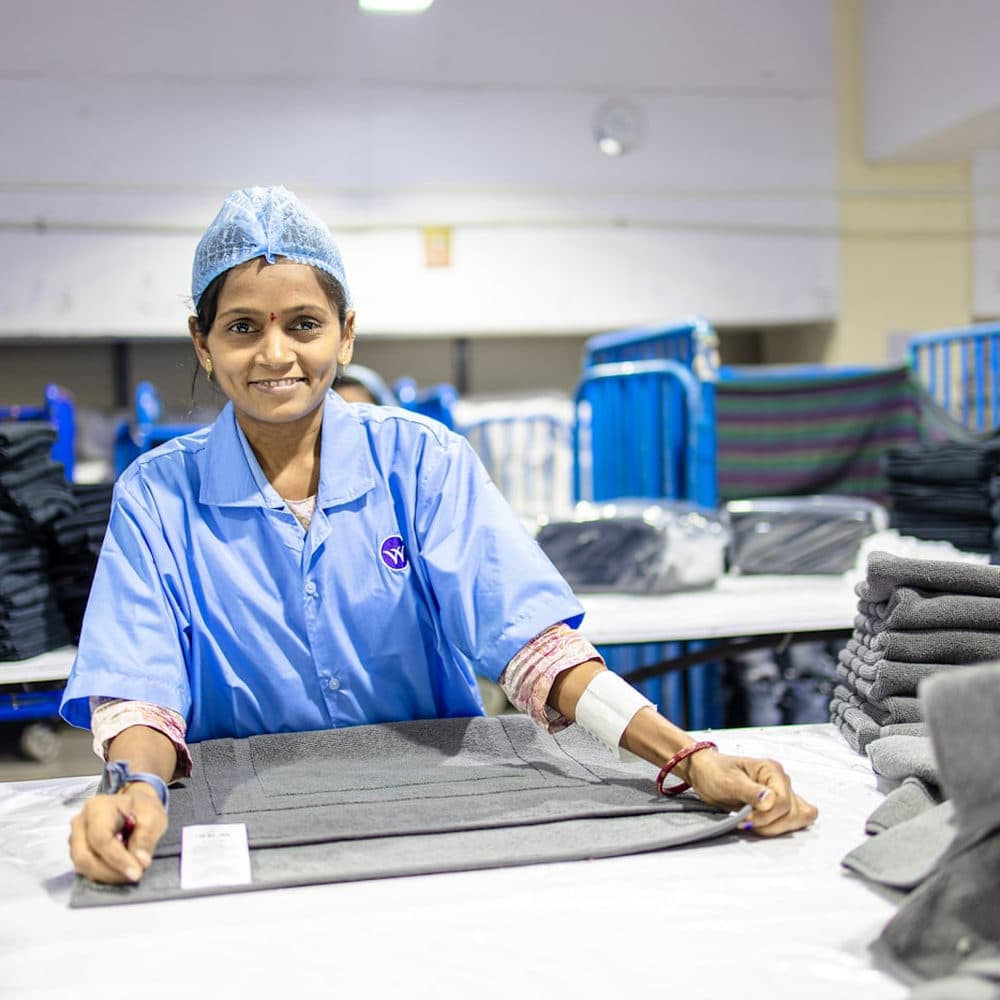 Folding finished garments in a factory